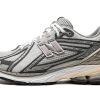 New Balance 1906R “INVINCIBLE x N.HOOLYWOOD Grey Swan” (M1906RNI)